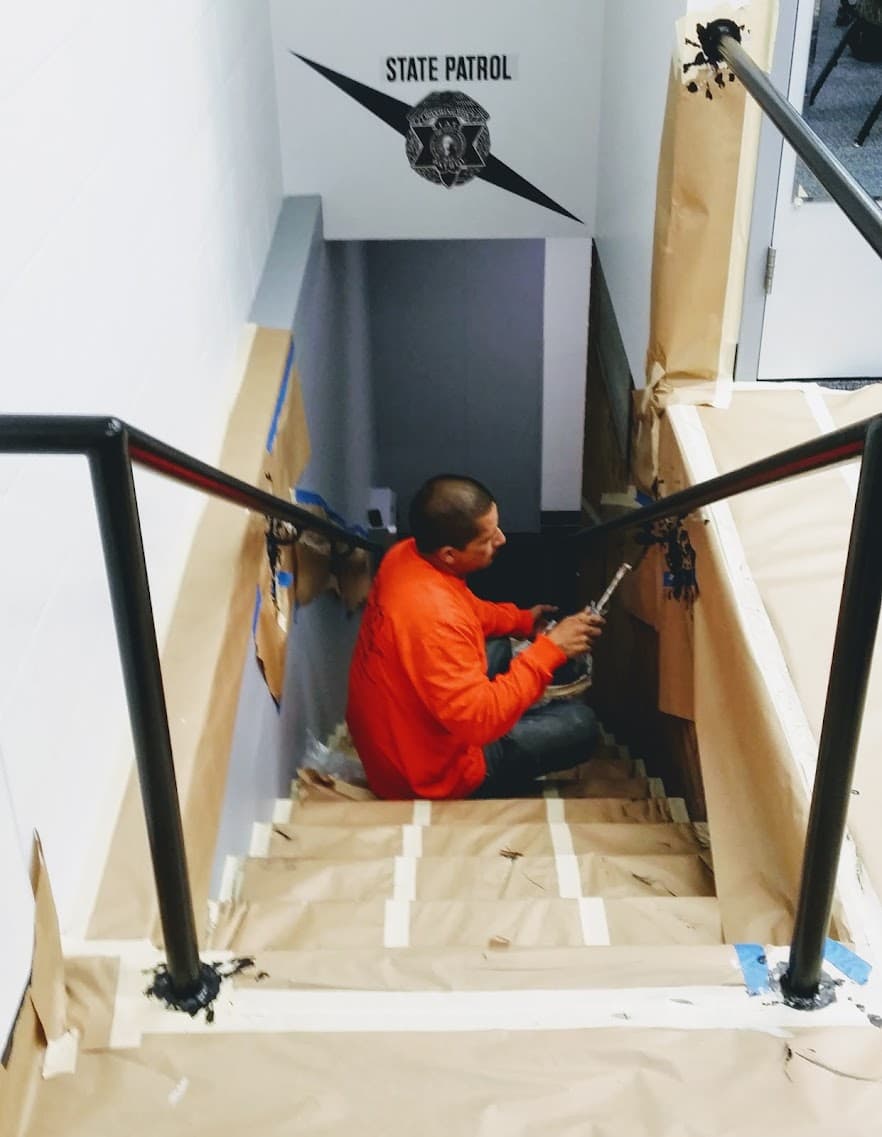Completed commercial handrail painting project by Alltech Painting in South Lake Union